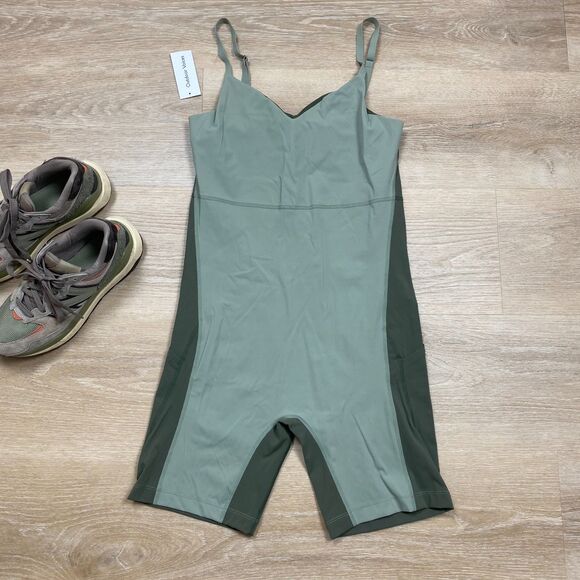 NWT Outdoor Voices Zoom 8” Bodysuit Women's L Color Sandstone/ Tea Tree - Picture 1 of 6